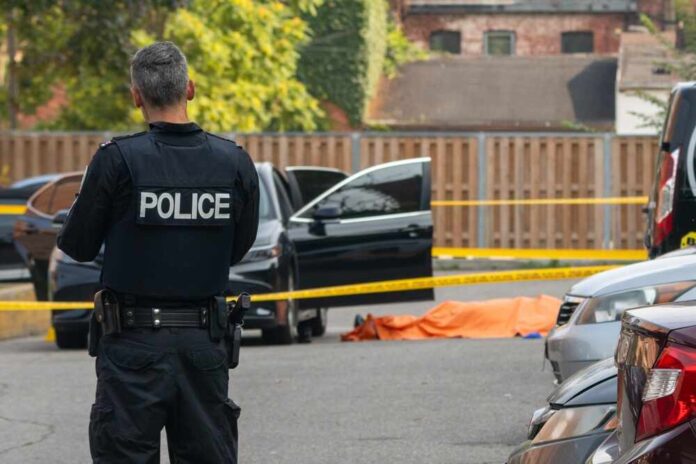 2339426805 featured image Police officer at a crime scene with tape