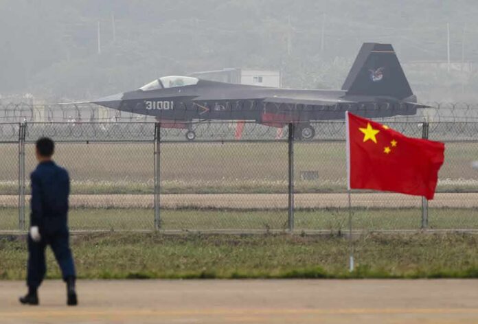 231381238 featured image Jet with 31001 marking behind barbed wire fence