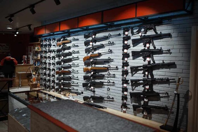 Wall display of various rifles in a gun store