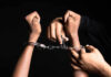 Handling handcuffs and unlocking with a key