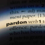 The word "pardon" highlighted in a dictionary.