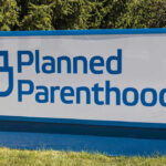 Planned Parenthood Stunned—Forced to Halt Abortions Statewide Planned Parenthood sign on a grassy lawn