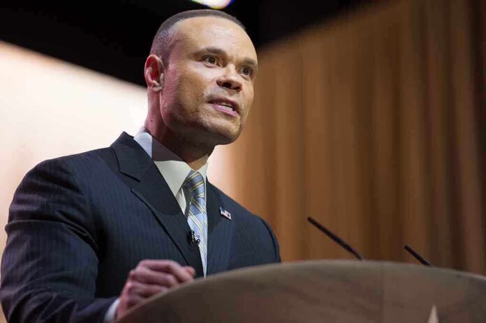 A man in a suit speaking at a podium during a conference