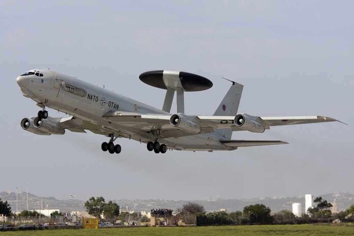 NATO AWACS aircraft taking off from an airfield