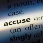 Hunt For Miss Universe Mogul Is ON! Close-up dictionary definition of accuse underlined.