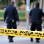 Atlanta Cop’s HOLIDAY Horror Police officers walking past caution tape at a crime scene