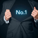 Man opening suit to reveal glowing number one