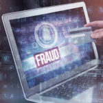 FEMA Fraud EXPOSED – Democrat Stole $5 MILLION! Person holding credit card near laptop displaying Fraud.