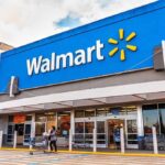 Exterior view of a Walmart store with customers entering