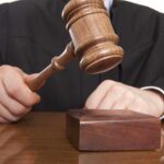 Democrats’ 10-1 Map Power Grab STOPPED A judge holding a gavel above a wooden block