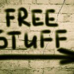 Socialist Mayor Admits “Free” Is NOT Going to Happen Graffiti on a brick wall stating FREE STUFF with an arrow