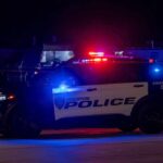 IRS Agent Plotted Wife’s Brutal Murder Houston police vehicle with emergency lights activated at night