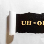 Loaded M4 DITCHED in Bathroom During Terror Threat Torn paper revealing UH-OH text underneath.