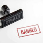 Gifted Program AXED–One Size Fits ALL Banned stamp and rubber stamp on white background.