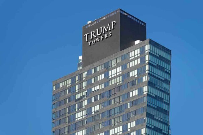 View of Trump Towers, a modern skyscraper with a glass facade against a clear blue sky