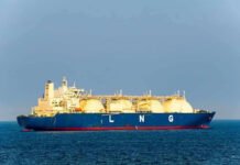LNG tanker ship sailing on open sea.