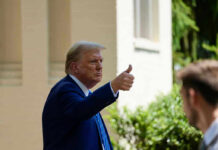 Hormuz Flashpoint: 7 Allies FINALLY Back Trump Man in suit giving thumbs up.