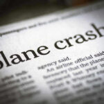 Airman Horror: Four Dead in Crash Newspaper headline about a plane crash story