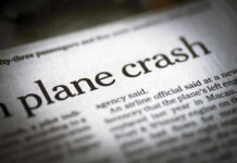 Newspaper headline about a plane crash story