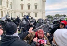 A tense standoff between protesters and police at a demonstration
