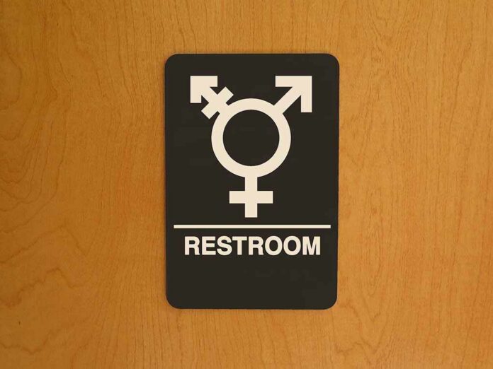 Sign indicating a gender-neutral restroom with symbols
