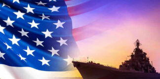 American flag overlaying warship at sunset.