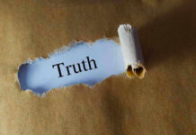 TRUMP FIRES AG—What’s TRUE, What’s NOT Ripped paper reveals word truth underneath brown surface