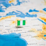 ISIS Commander Dead in Bold Operation Flag pin marking Nigeria on Africa map.