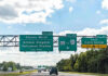 Highway exit signs for Disney World attractions.