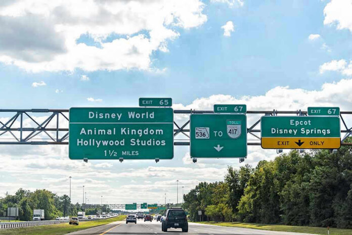 Highway exit signs for Disney World attractions.