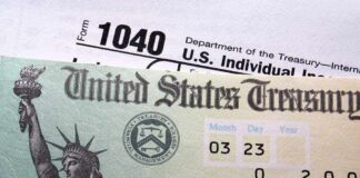 Close-up of a U.S. Treasury check and tax form 1040