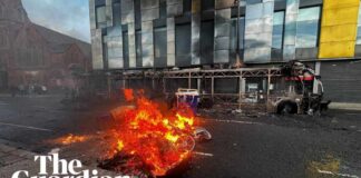 Bus and cars burned in anti-immigration protests in Belfast after stabbing