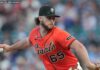 Cap Scribbles Spark Federal Heat Florida AG takes aim at Major League Baseball over cap controversy