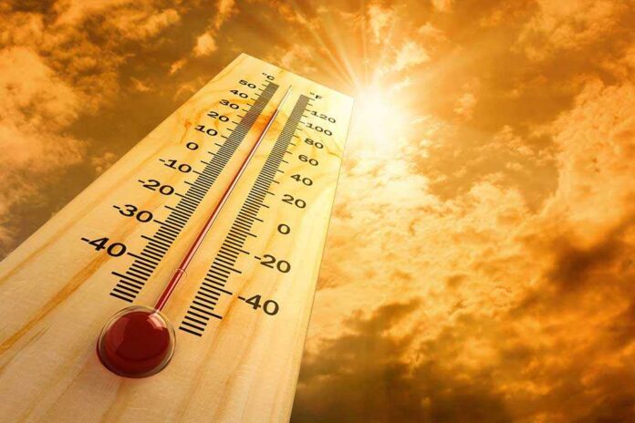 Thermometer,In,The,Sky,,The,Heat A thermometer displaying temperature against a sunset sky