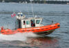 East River Déjà Vu: Plane Down Again Coast Guard boat speeding on the water.