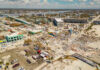 Venezuela’s Earthquake Death Toll Rising — And the Response That Fell Short Aerial view of hurricane-damaged buildings and debris.