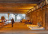 Atlanta Cleanup Ignites Homelessness Firestorm People walk under a bridge with homeless encampment.