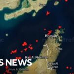 Iran strikes vessel in Strait of Hormuz amid fee debate