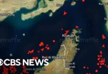Iran strikes vessel in Strait of Hormuz amid fee debate