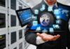 Businessperson holding a digital tablet with floating data icons