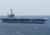 Aircraft carrier sailing at sea