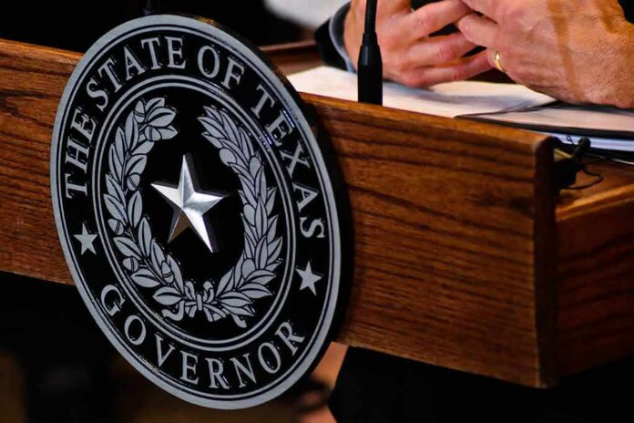 shutterstock_1128379292 Texas governor seal on wooden podium