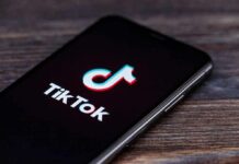 smartphone displaying the TikTok app logo on screen