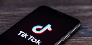 smartphone displaying the TikTok app logo on screen