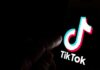 TikTok logo on a smartphone screen