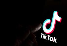 TikTok logo on a smartphone screen