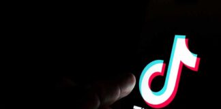 TikTok logo on a smartphone screen