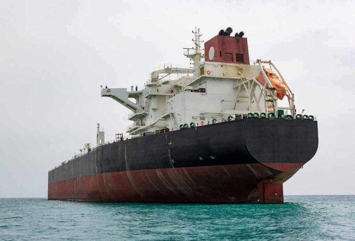 shutterstock_1985991914 Large oil tanker anchored in calm sea