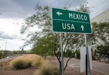 Road sign pointing to Mexico and USA at border area
