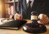 Sentencing Erupts: Cuffs Shatter, Dash for Door Judge with gavel striking sound block